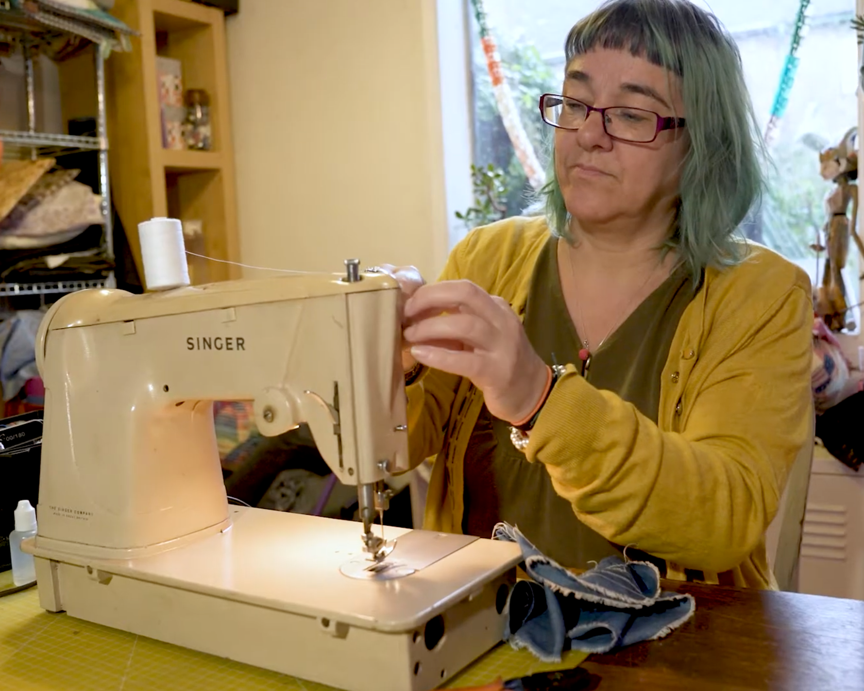 Jenni working on a sewing machine